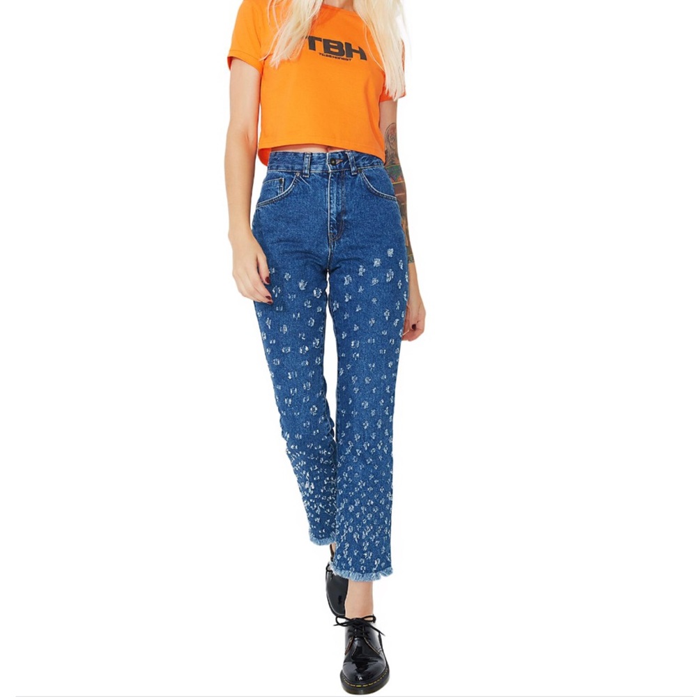 Ripped and distressed high waisted jeans